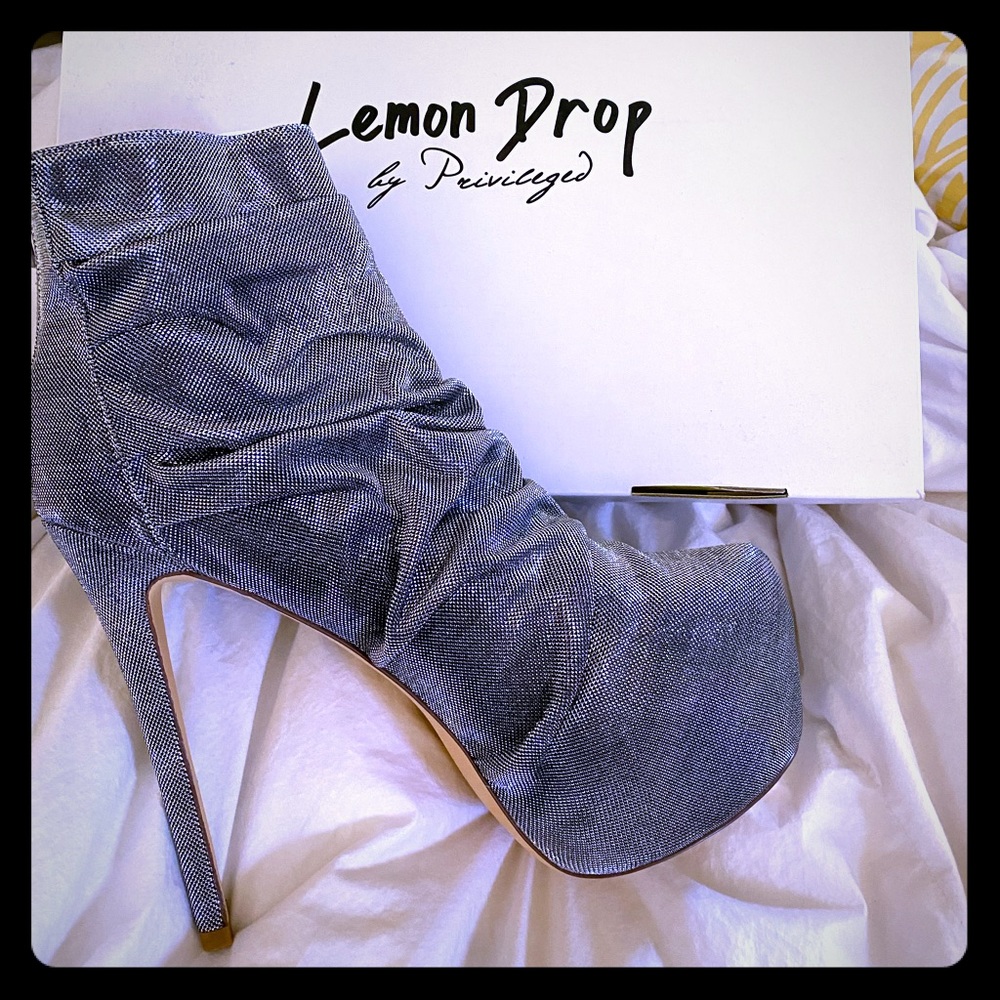 New in box stiletto heels with platform front